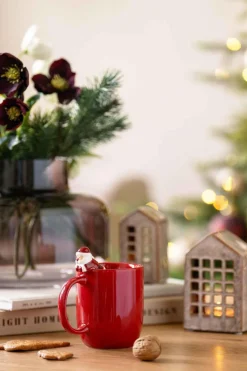 Kopp med nisse på kanten